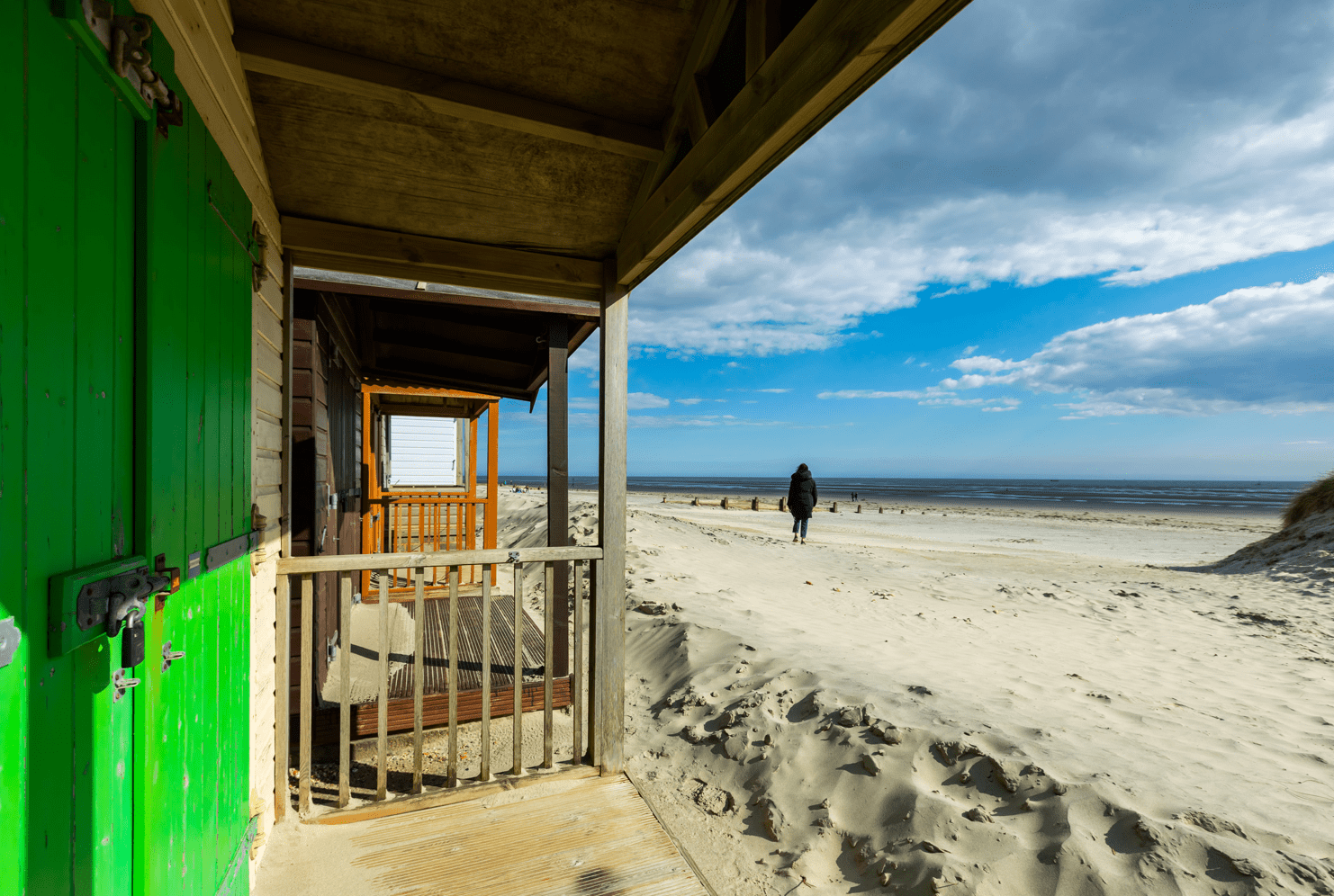 A photo of beach huts looking out to sea