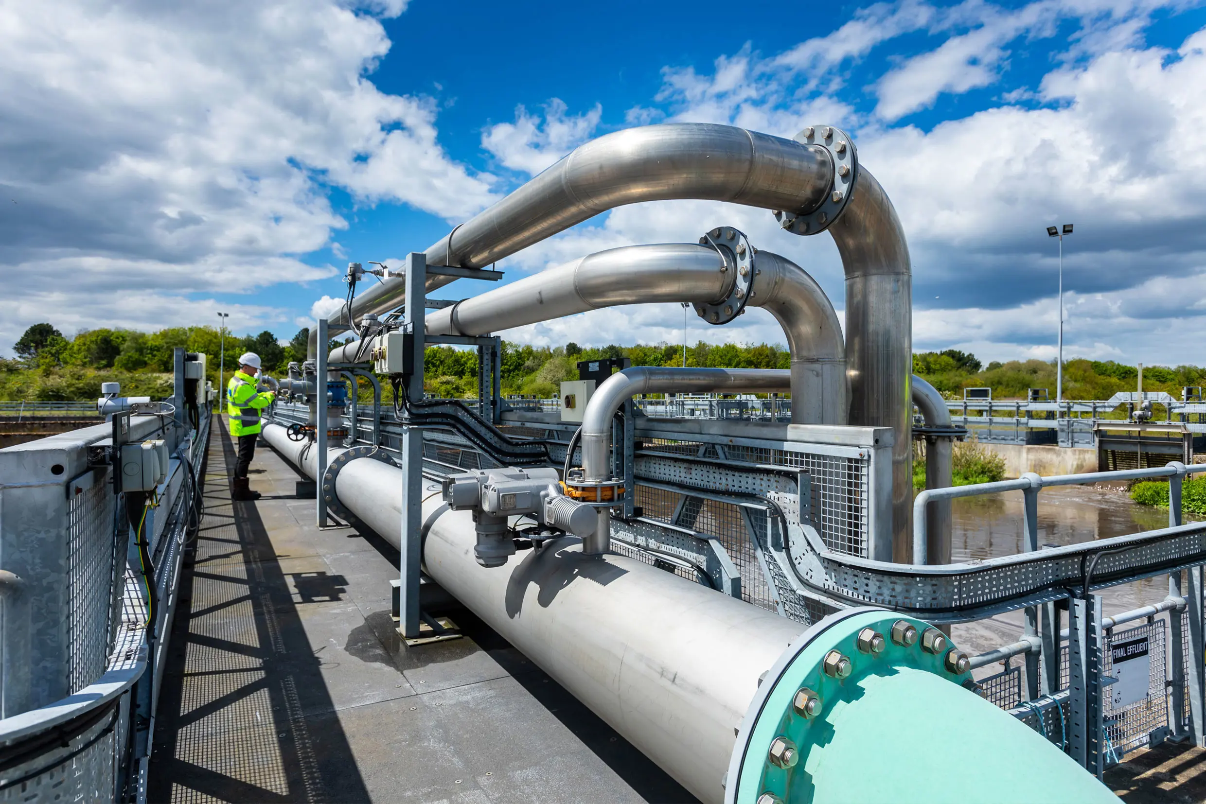 Engineer checking valves at treatment site