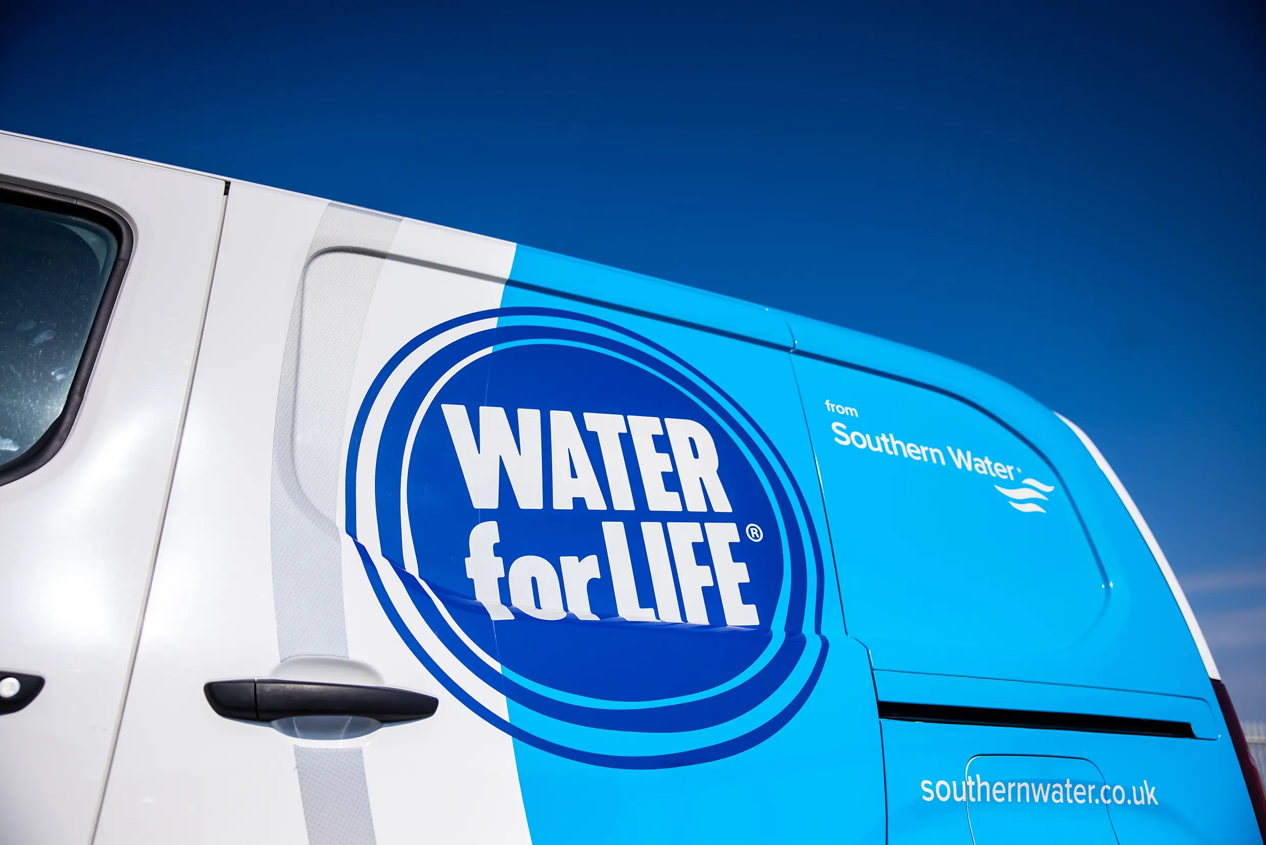 A close up shot of a southern water van